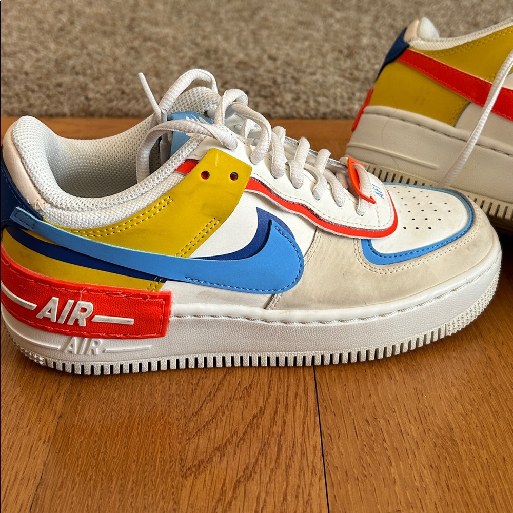 Nike Air Force 1 with Red, Blue, and Yellow Accents